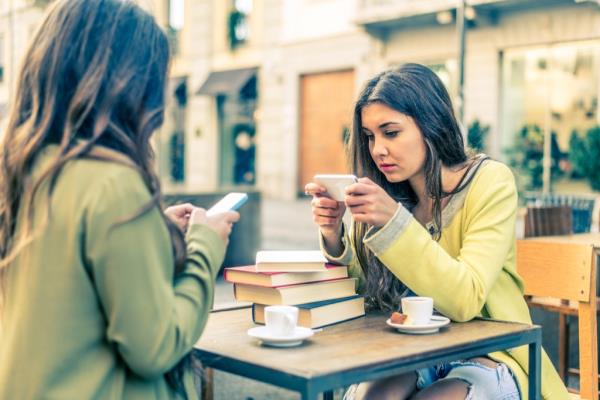 Women on smartphones Facts about Millennials